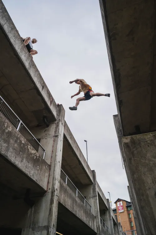 Arthur Gledhill-Franks leaping between multi-storey car park structures
